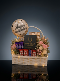 Anniversary gift box by The Goat Fragrance, perfume gift with chocolates, flowers and balloon hamper